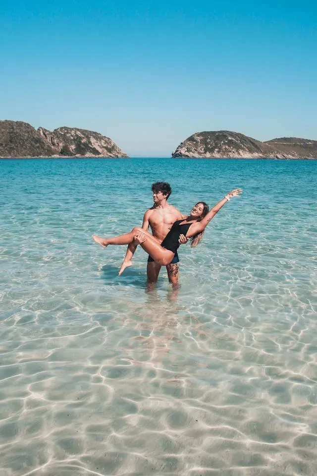 Couple enjoying their honeymoon on beach